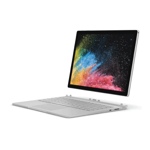 A silver Microsoft Surface Book 2 i5 8350U (8GB, 256GB, 13.5" Touch) convertible laptop is shown with colorful abstract art on the screen, highlighting its versatility as both a laptop and tablet.